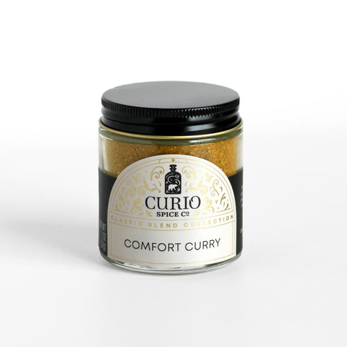 Curio Spice Co. Classic Blend Comfort Curry in a glass jar.