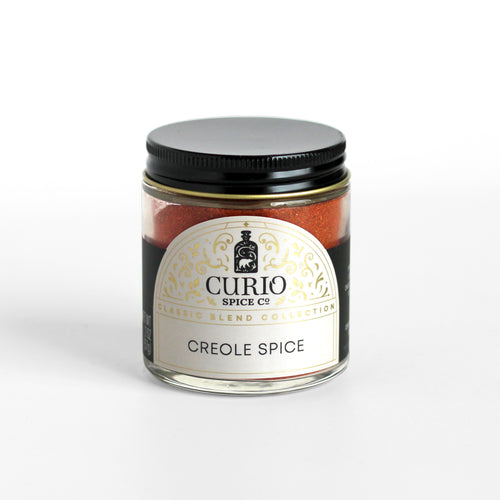 Curio Spice Co. Classic Blend Creole Spice in a glass jar.