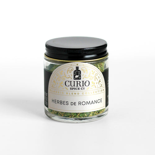 Curio Spice Co. Classic Blend Herbes de Romance in a glass jar.