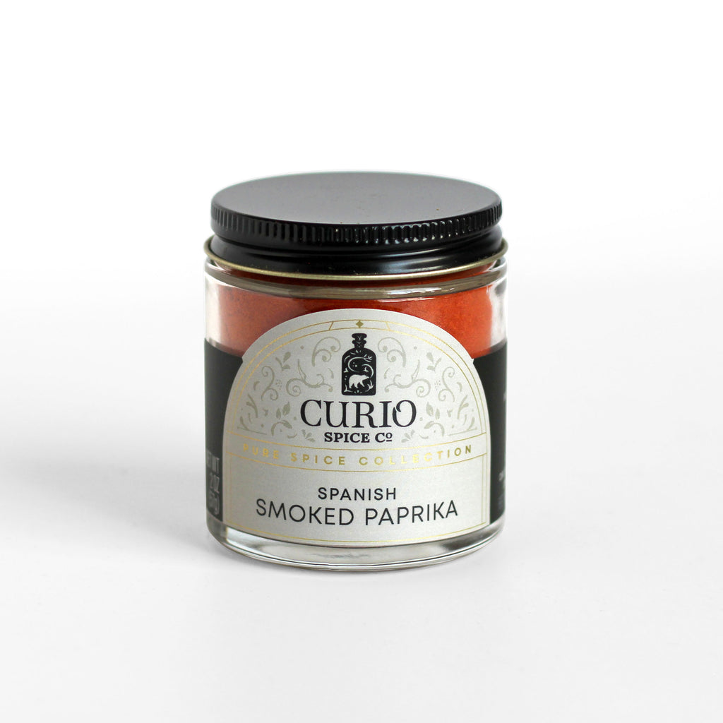 Curio Spice Co. fair-trade single origin sustainable Spanish Smoked Paprika in a glass jar.