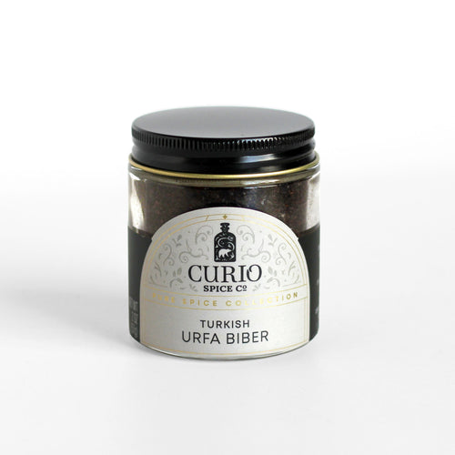 Curio Spice Co. fair-trade single origin sustainable Turkish Urfa Biber chile flakes in a glass jar.