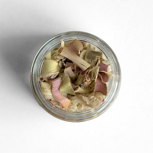 Curio Spice Co. fair-trade single origin sustainable Rhode Island Lemongrass Pieces in a glass jar.