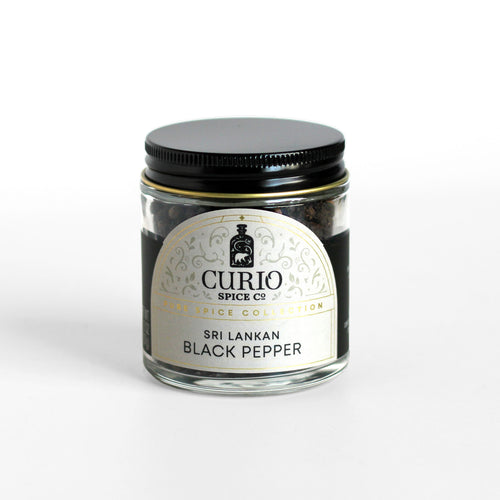 Curio Spice Co. fair-trade single origin sustainable Sri Lankan Black Pepper in a glass jar.