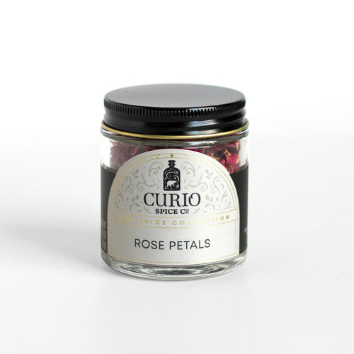 Curio Spice Co. fair-trade single origin sustainable Rose Petals in a glass jar.