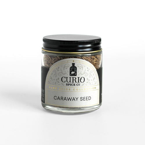 Curio Spice Co. fair-trade single origin sustainable Caraway Seed in a glass jar.