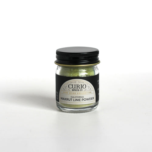 Curio Spice Co. fair-trade single origin sustainable California Makrut Kaffir Lime Leaf Powder in a jar.