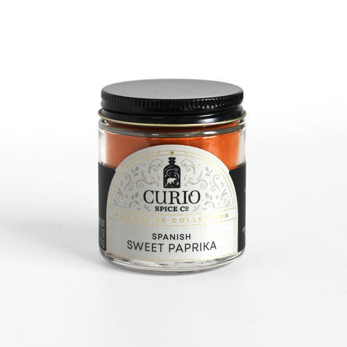 Curio Spice Co. fair-trade single origin sustainable Spanish Sweet Paprika in a glass jar.