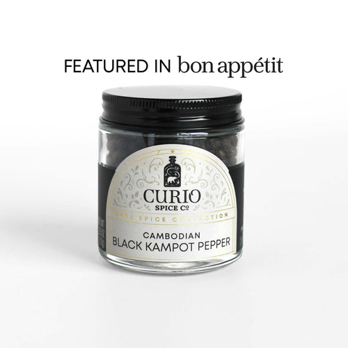 Curio Spice Co. fair-trade single origin sustainable Cambodian Black Kampot Pepper in a glass jar, as featured in Bon Appetit.