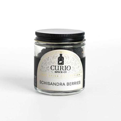 Curio Spice Co. fair-trade single origin sustainable schisandra berries in a glass jar.