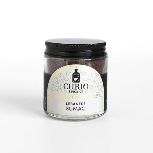 Curio Spice Co. fair-trade single origin sustainable Lebanese sumac in a glass jar.