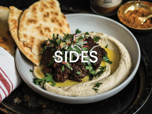 Curio Spice Co. recipe category for side dishes, featuring Preserved Lemon Hummus with Baharat Spiced Lamb 