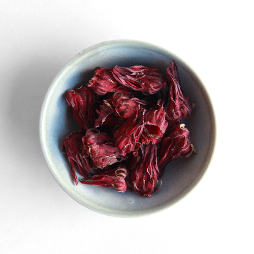 Curio Spice Co. fair-trade single origin sustainable Roselle in a small dish.